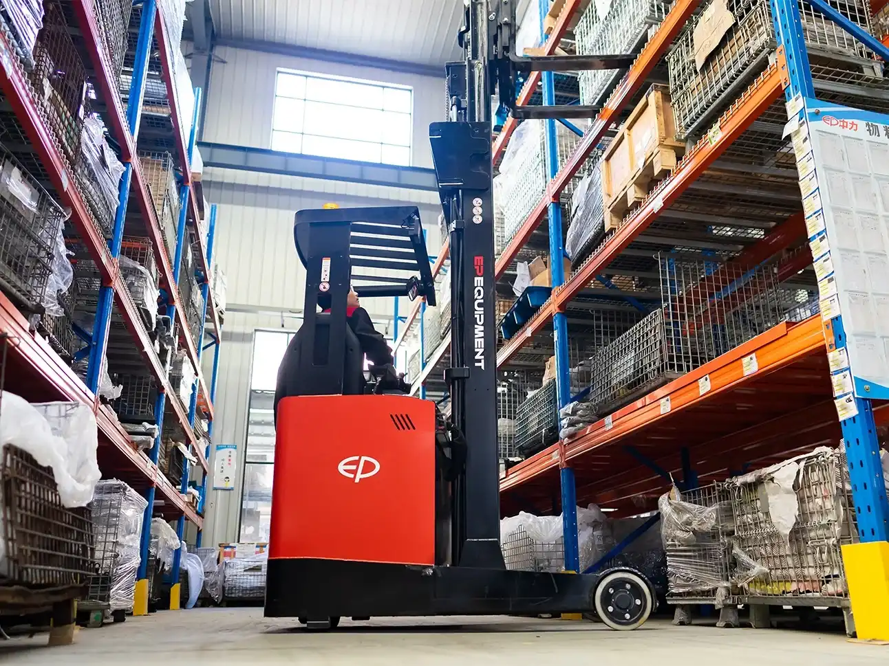 Thumbnail of EP Equipment CQD20L electric reach truck operating in a warehouse, lifting goods to high storage racks with precision and stability.