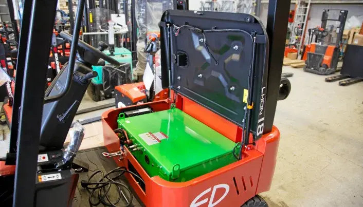 Lithium-ion battery of EFL181 four-wheel electric forklift by EP Equipment, showing compact design and easy access for maintenance