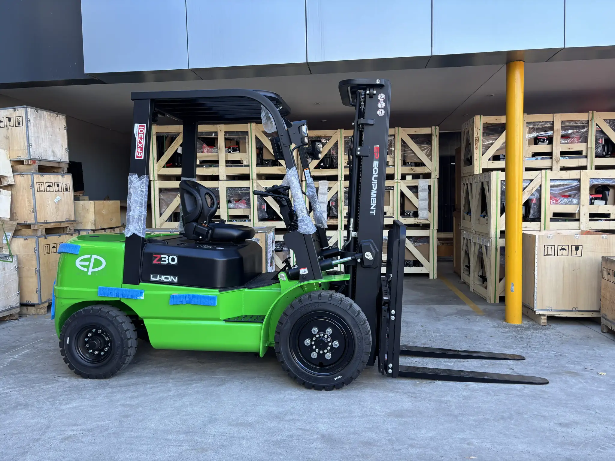 On site right view of EFXZ-301 refurbished 3.0T lithium electric forklift by EP Equipment.