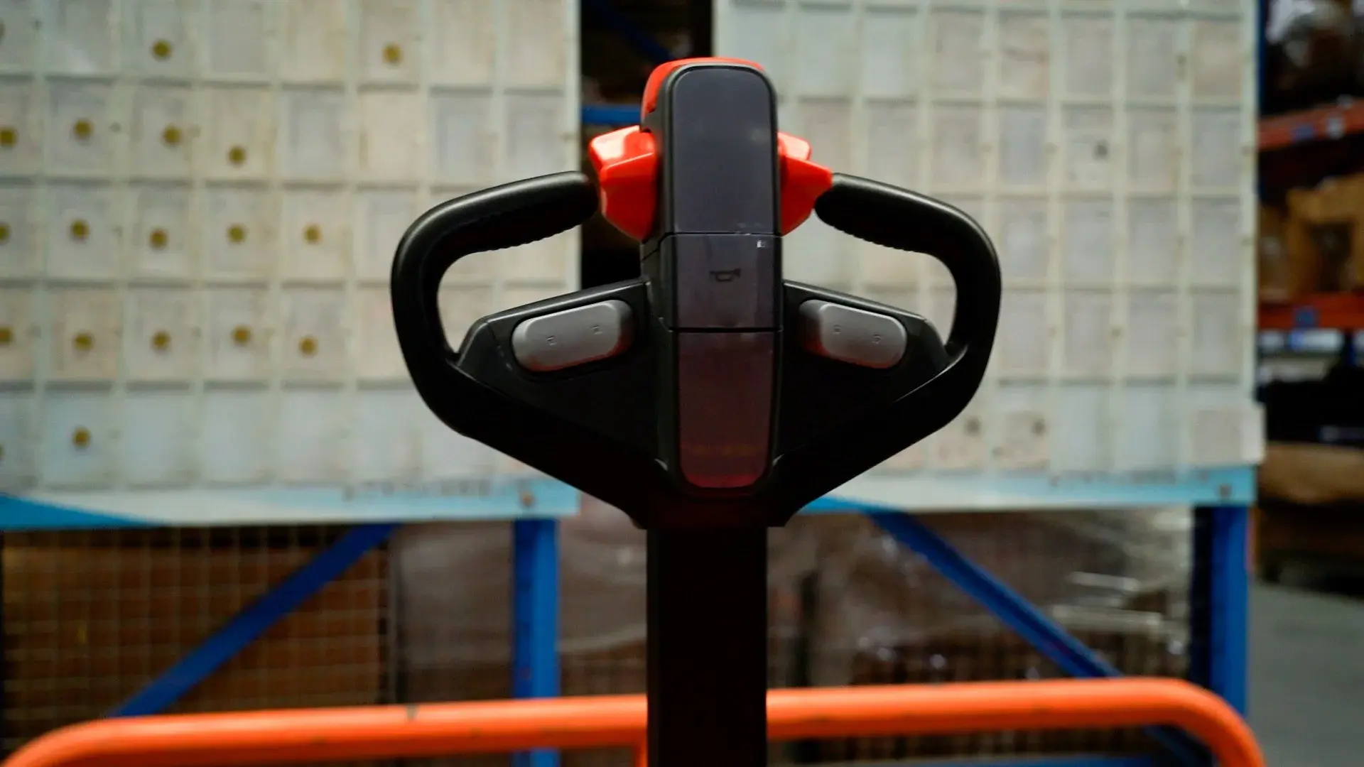 Ergonomic tiller handle of EP Equipment WPL202 electric pallet truck for precise control and safety.