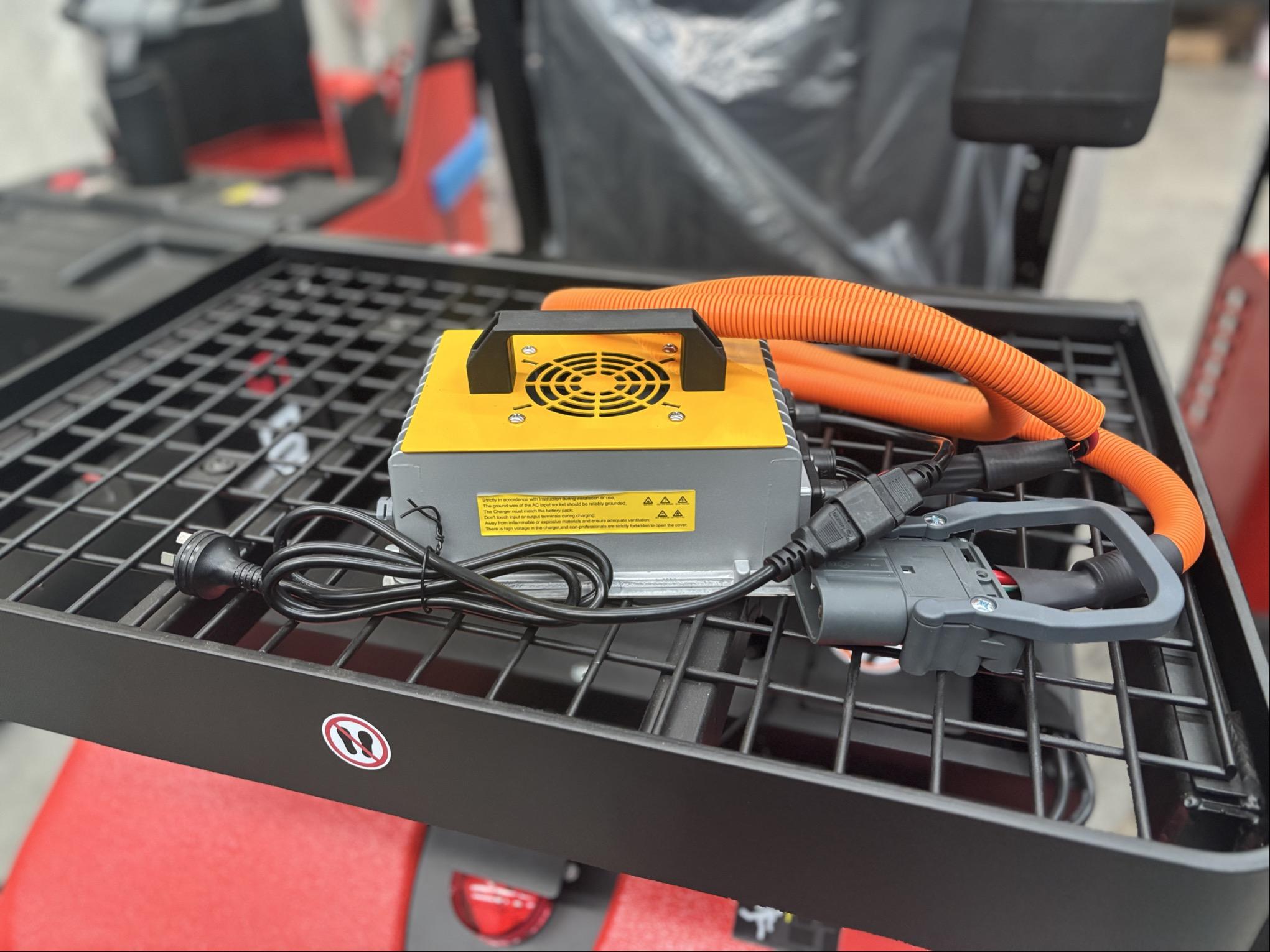 EP Equipment 24V 50A lithium battery charger for warehouse equipment, featuring fast opportunity charging capabilities.