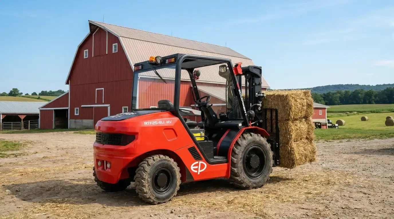 EPower 4WD lithium rough terrain forklift transporting hay bales on an agricultural farm