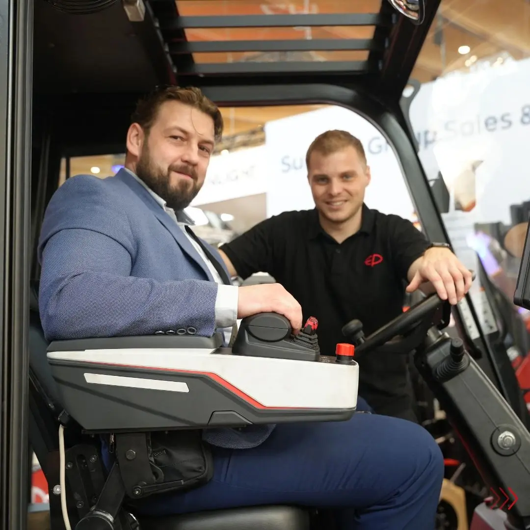 Customer testing the comfort and ergonomics of EP’s lithium forklift cabin.