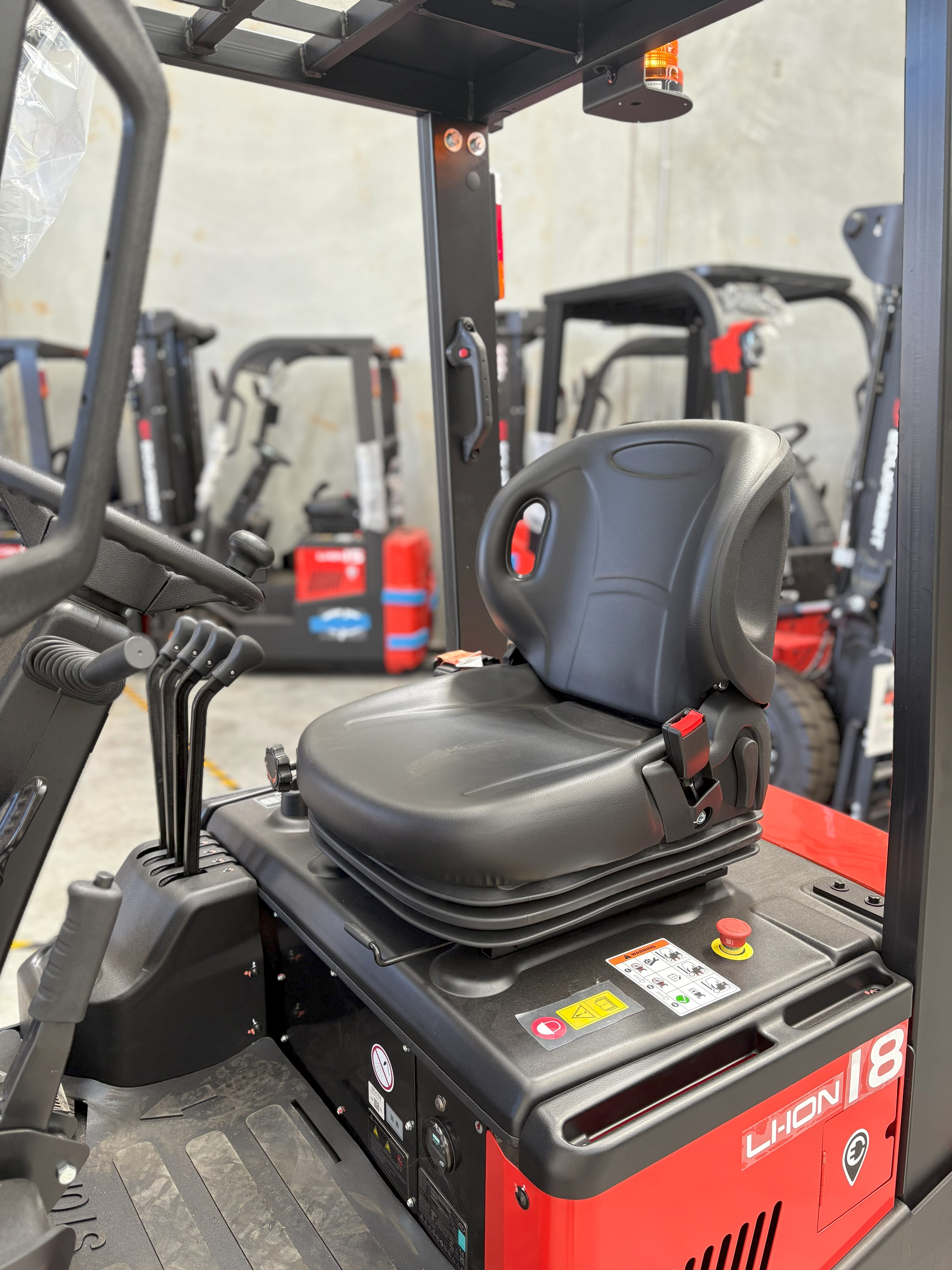Close-up view of the suspension seat of CPD18TVL three-wheel lithium-ion electric forklift by EP Equipment