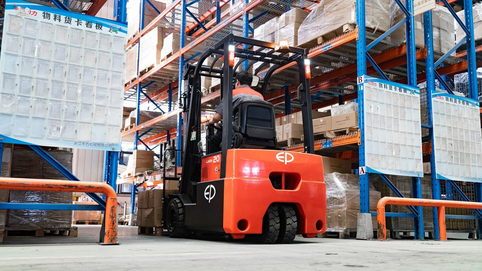 Operator using EP Equipment CPD20TVL 2.0T three-wheel lithium-ion electric forklift in a warehouse, demonstrating smooth and efficient material handling in narrow aisles.