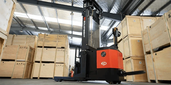 EP Equipment CQE15S electric walkie reach stacker operating in warehouse, ideal for stacking pallets and lifting goods efficiently.