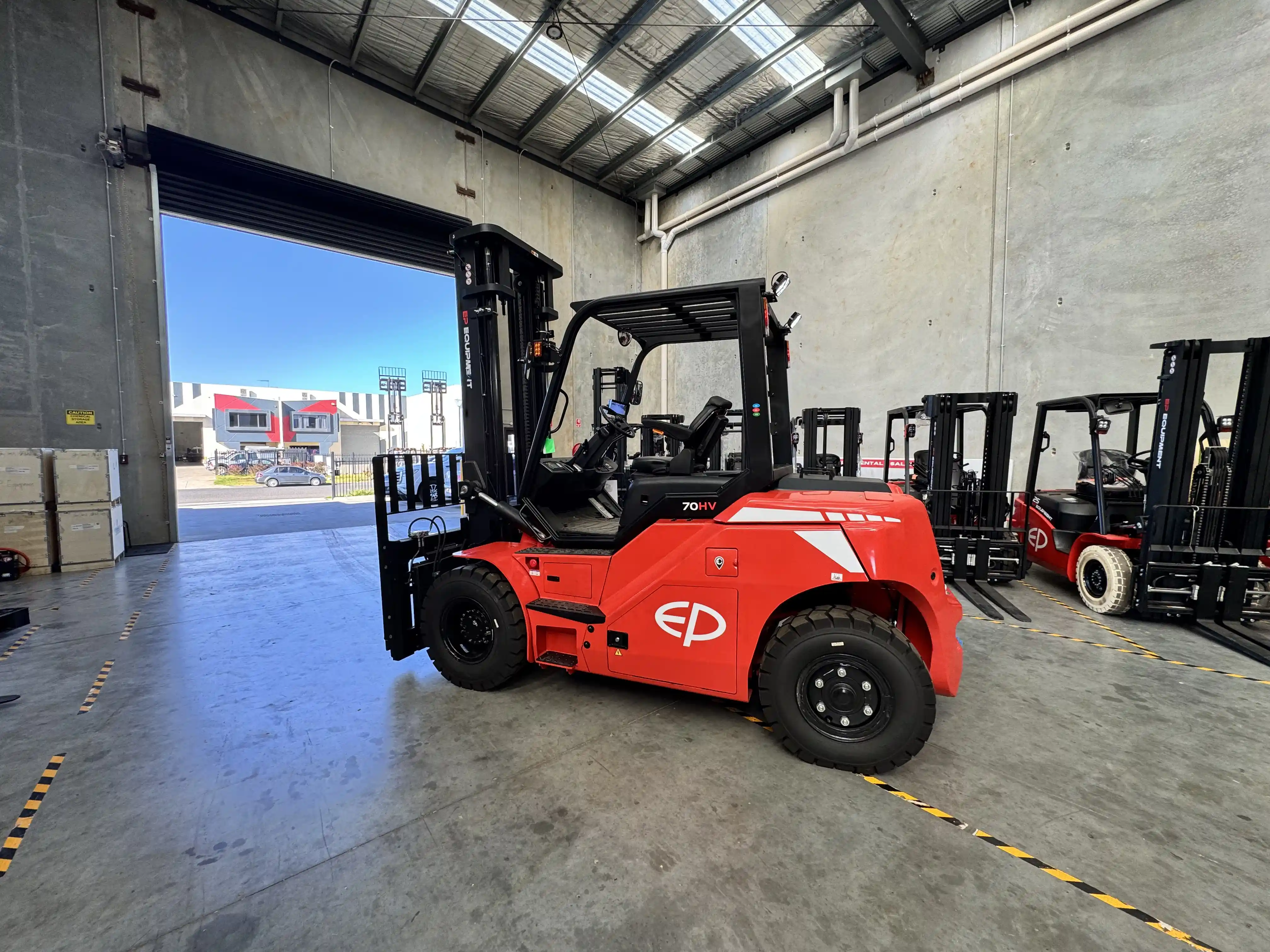 Stock photo of EFL703-HV 7.0T high capacity lithium electric forklift by EP Equipment in high voltage version.