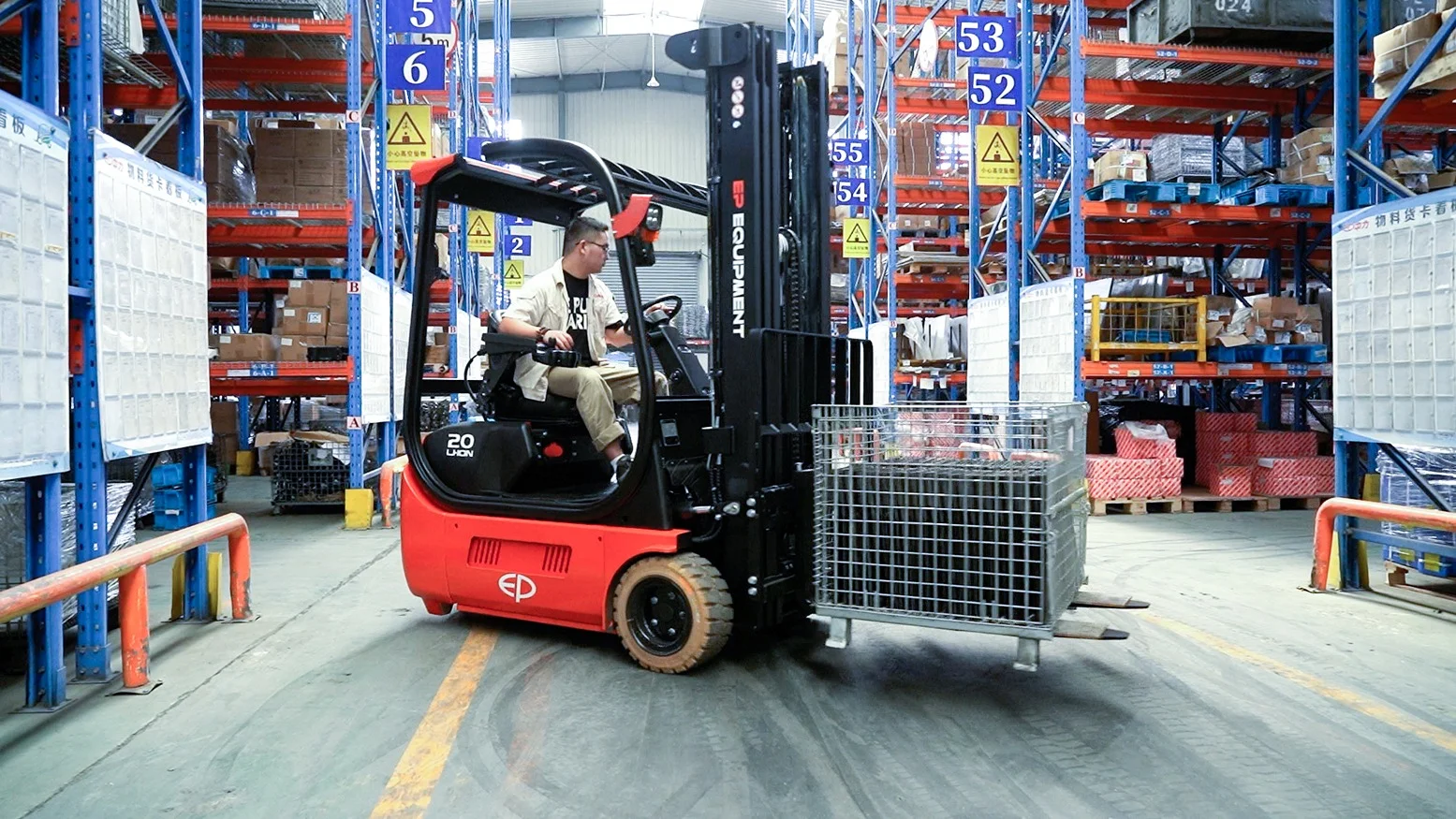 Operator driving EP Equipment TDL201 2.0T three-wheel lithium-ion electric forklift in a warehouse, demonstrating precise control and compact turning for efficient material handling.